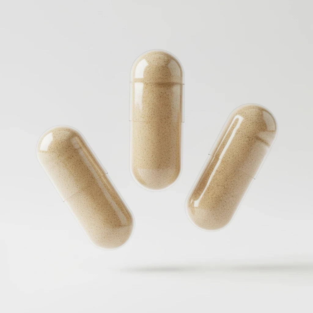 HYGÉE La Peau supplement capsules floating on white background — product macro photo